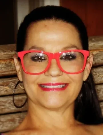 Image of Olga B. smiling for testimonial